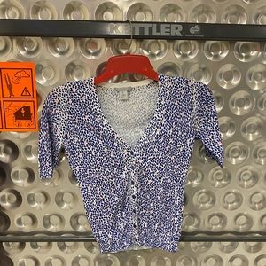 Woman’s buttoned top